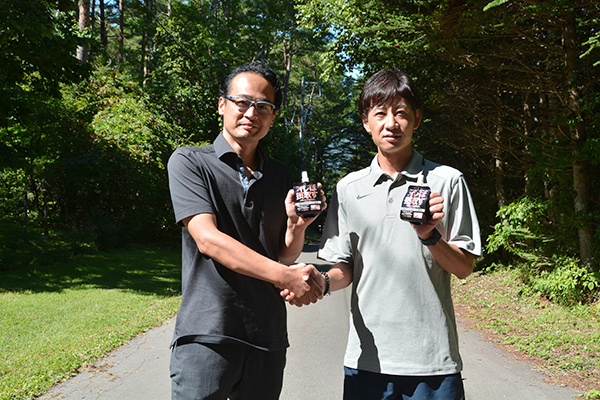 Saito and coach Sakai in a later interview photograph